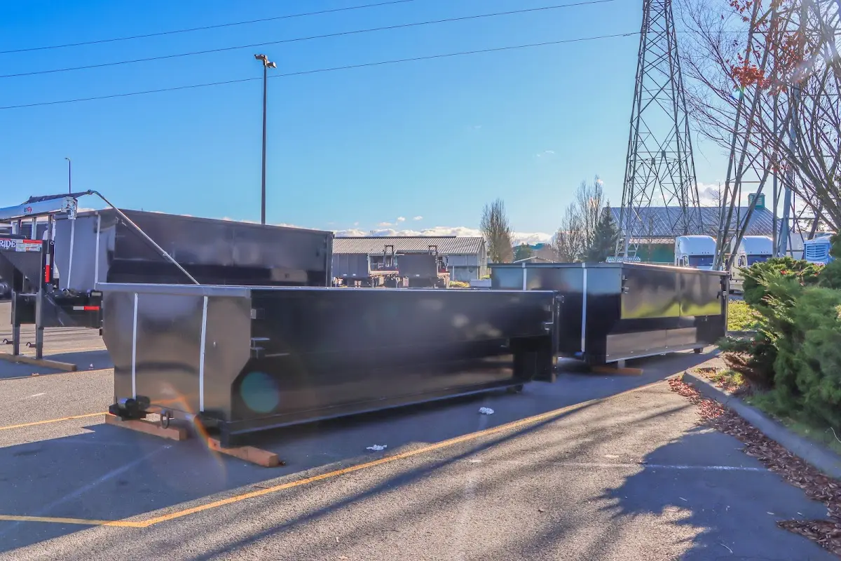 Roll-off dumpster ready for waste disposal at job site for 2 Yard Dumpster Rental in Geneva